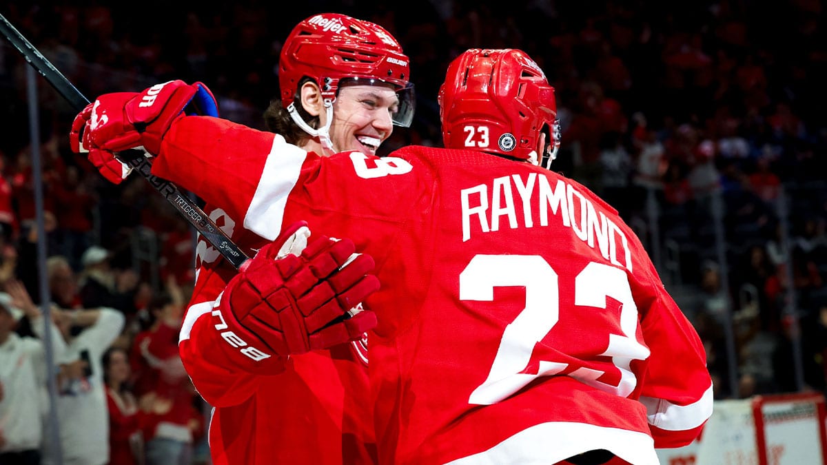 Detroit Red Wings left wing Lucas Raymond (23) receives congratulations from defenseman Moritz Seider (53) after scoring in the second period against the Winnipeg Jets at Little Caesars Arena.