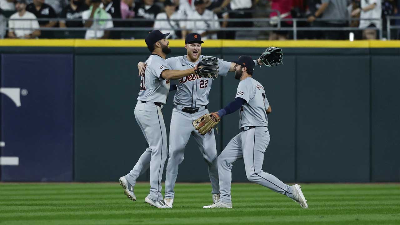 Detroit Tigers players celebrate after defeating the Chicago White Sox in a baseball game at Guaranteed Rate Field.
