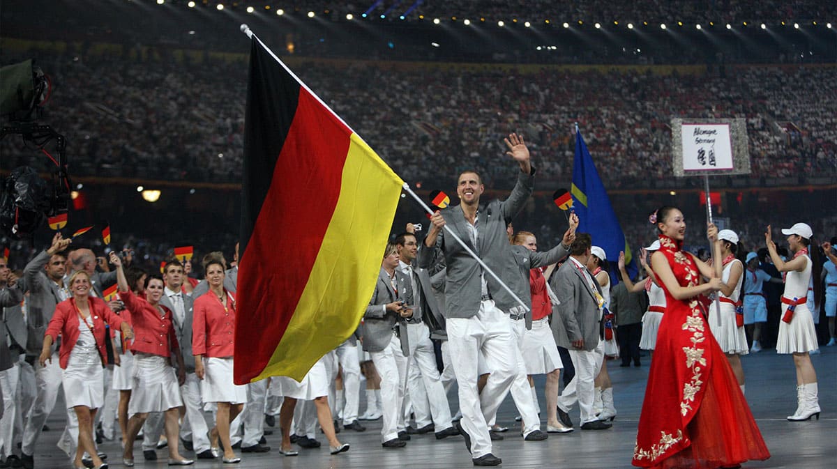 Germany basketball player Dirk Nowitzki leads his teammates into the stadium during the opening ceremonies for the 2008 Beijing Olympic Games at National Stadium.