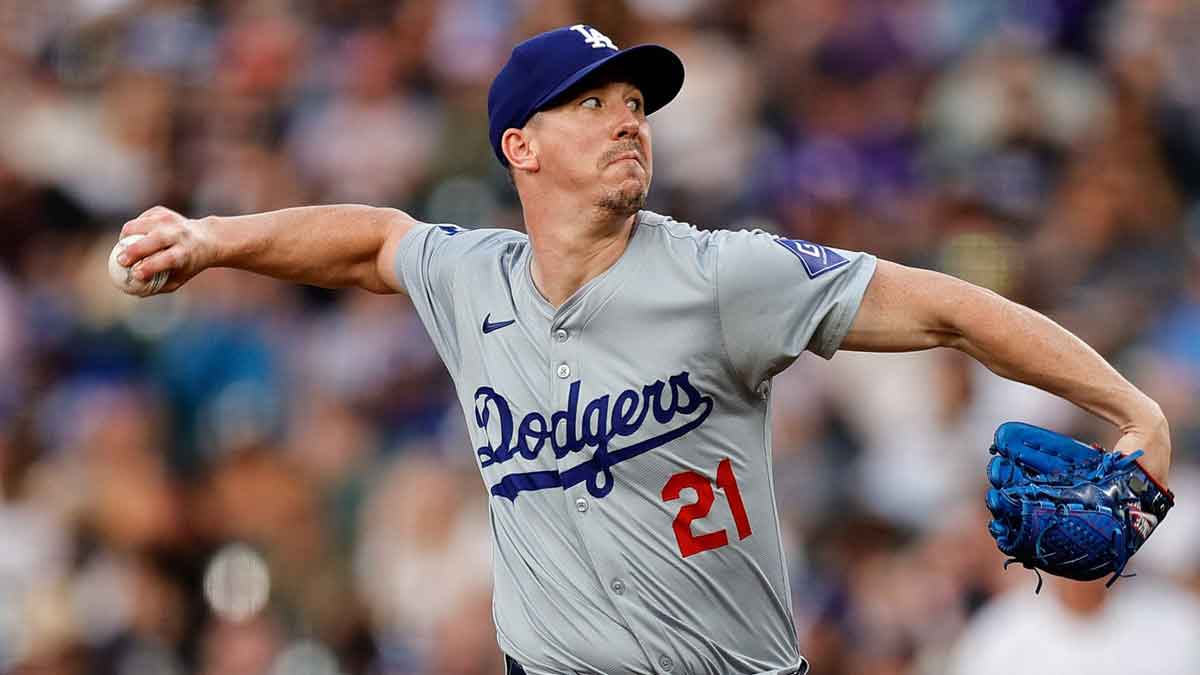 Los Angeles Dodgers starting pitcher Walker Buehler (21) pitches in the second inning against the Colorado Rockies at Coors Field.