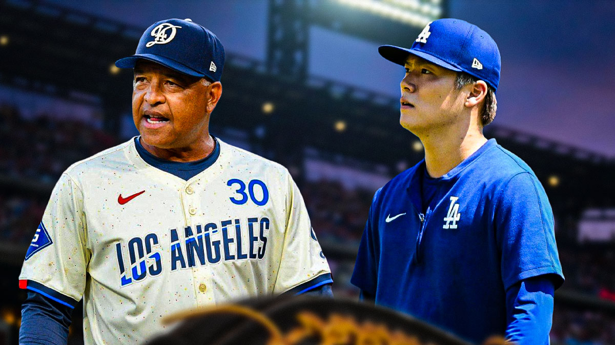 Dodgers manager Dave Roberts next to Dodgers starting pitcher Yoshinobu Yamamoto