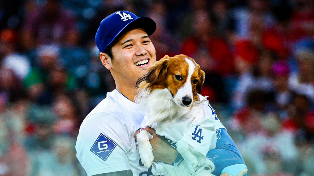 Los Angeles Dodgers star Shohei Ohtani and his dog named Decoy in front of Dodger Stadium.