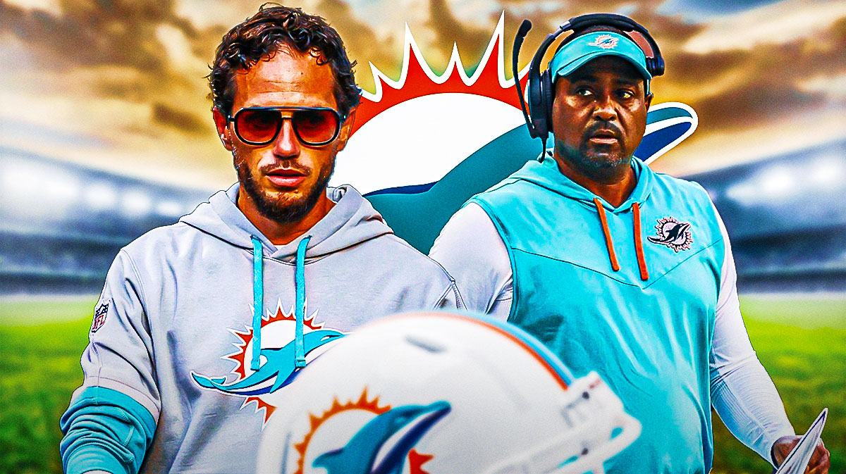 Miami Dolphins head coach Mike McDaniel with Dolphins coach Jon Embree. There is also a logo for the Miami Dolphins.