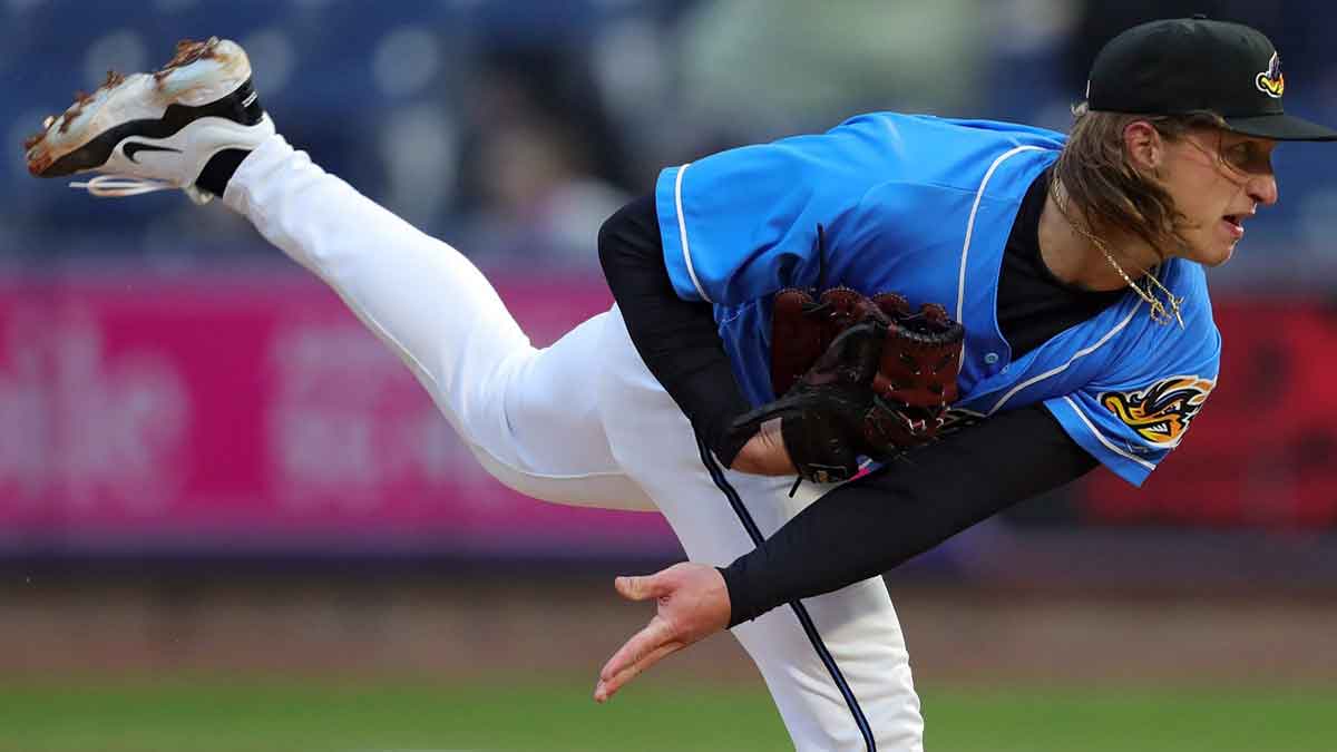 Akron RubberDucks pitcher Doug Nikhazy (29) follows through on a pitch during the first inning of an opening-day baseball game against the Altoona Curve at Canal Park, Friday, April 5, 2024, in Akron, Ohio.