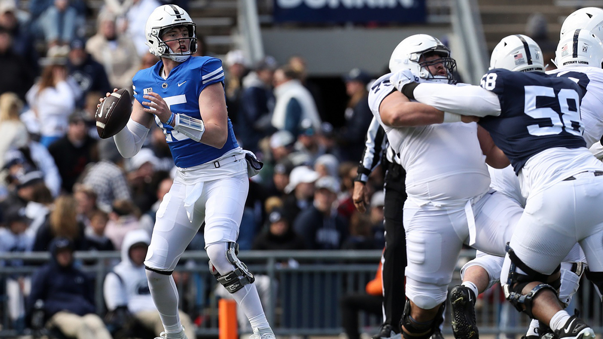 Penn State Nittany Lions quarterback Drew Allar (15) drops back and looks to throw a pass during the fourth quarter of the Blue White spring game at Beaver Stadium. The White team defeated the Blue team 27-0.