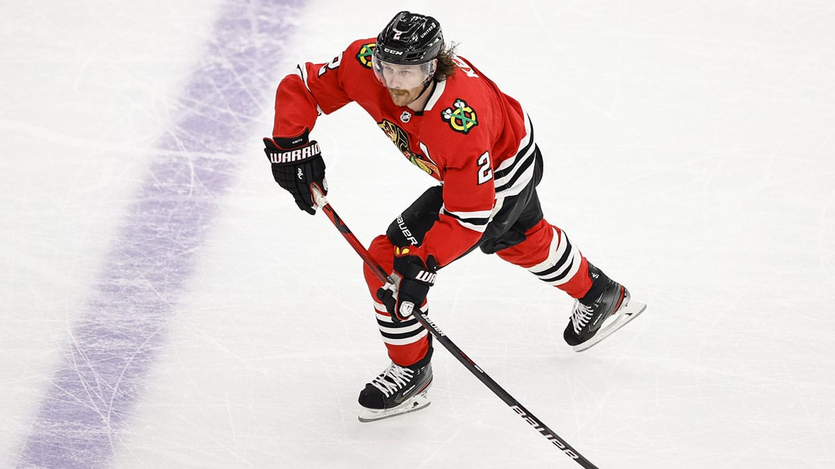 Chicago Blackhawks defenseman Duncan Keith (2) looks to pass the puck against the Nashville Predators during the first period at United Center. 