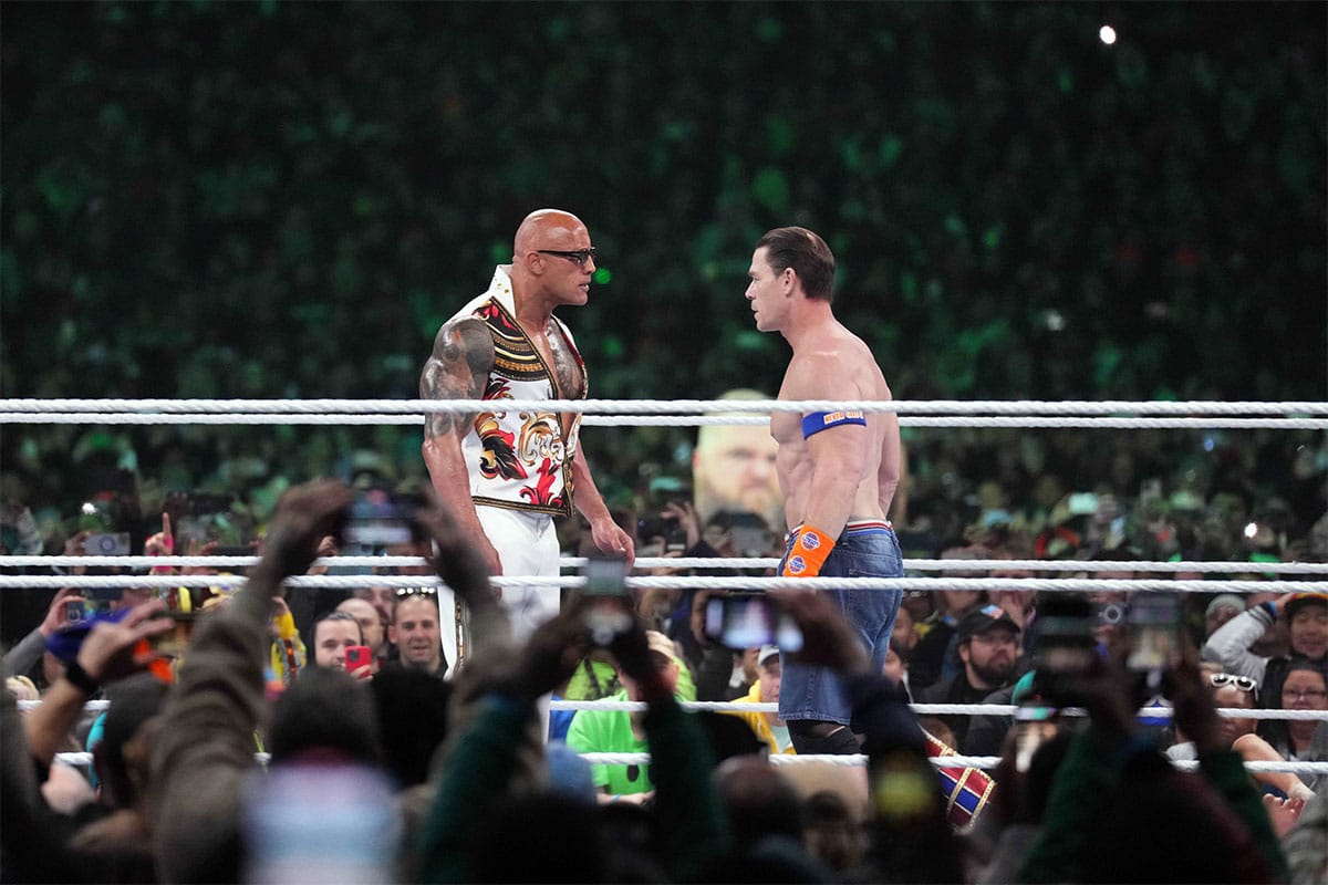 Dwayne "The Rock" Johnson and John Cena square off at WrestleMania XL on April 7, 2024.