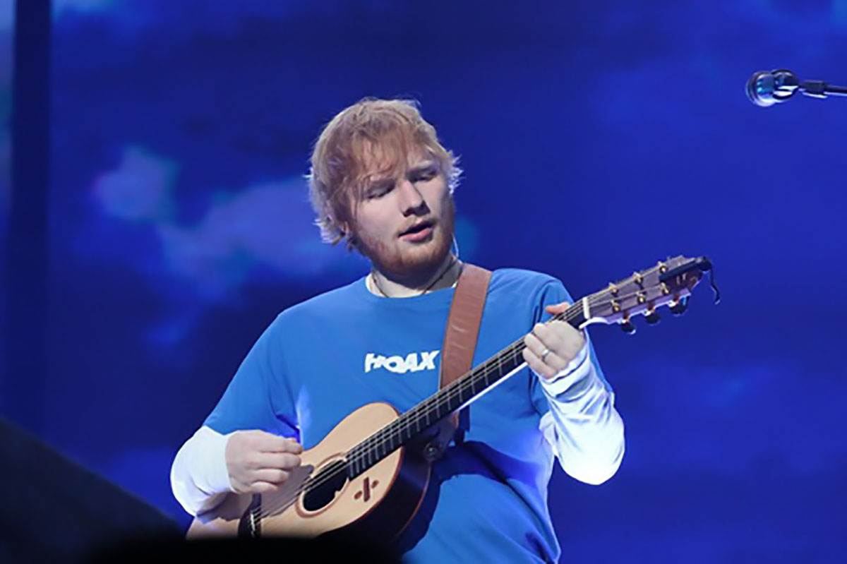 Ed Sheeran performing on the Divide Tour in 2018.
