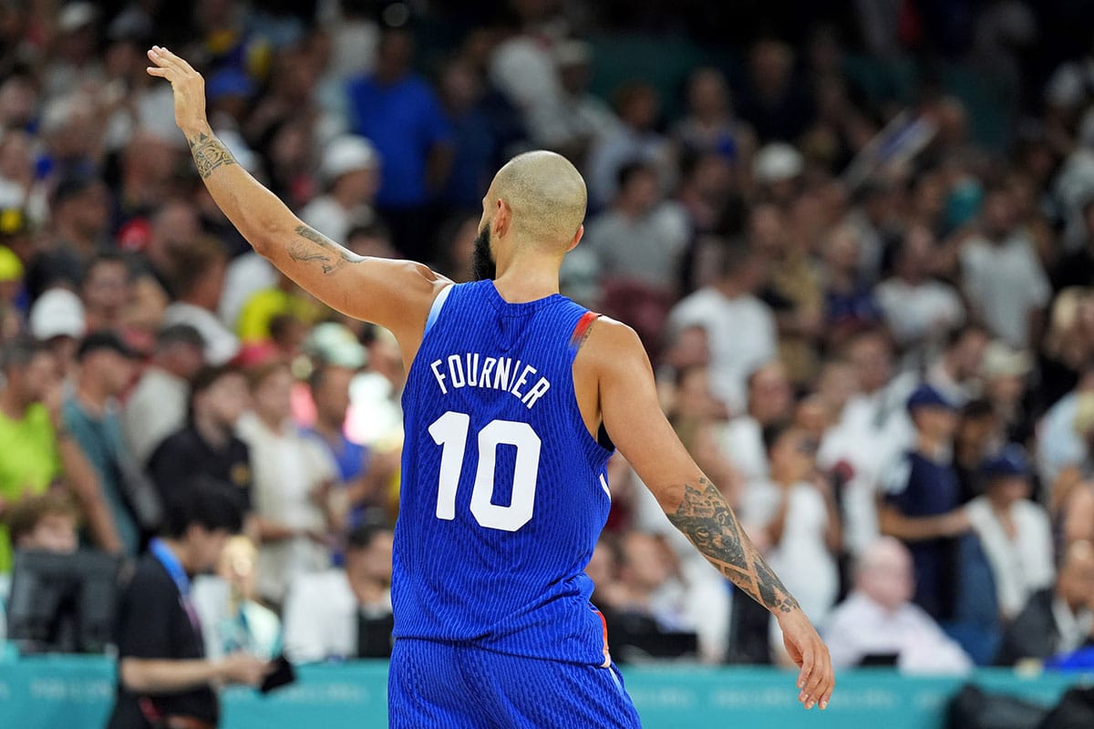 France shooting guard Evan Fournier (10) celebrates with the crowd after France defeated Japan in men’s basketball group B play during the Paris 2024 Olympic Summer Games at Stade Pierre-Mauroy.