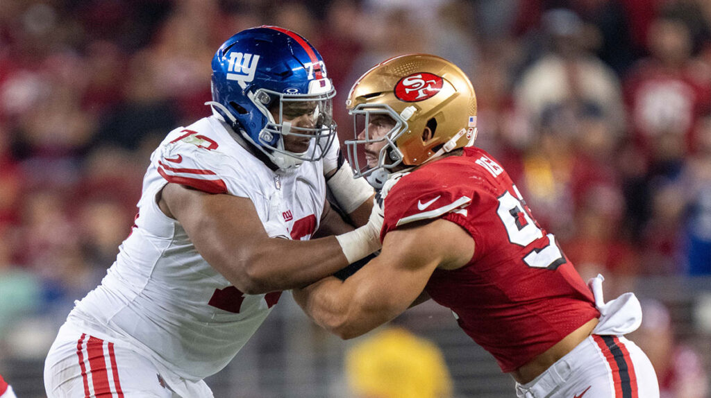 New York Giants offensive tackle Evan Neal (73) blocks San Francisco 49ers defensive end Nick Bosa (97) during the fourth quarter at Levi's Stadium. 