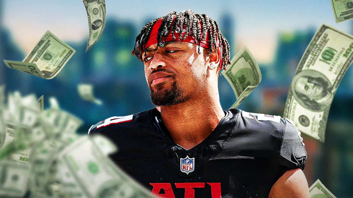 A.J. Terrell with money flying all over