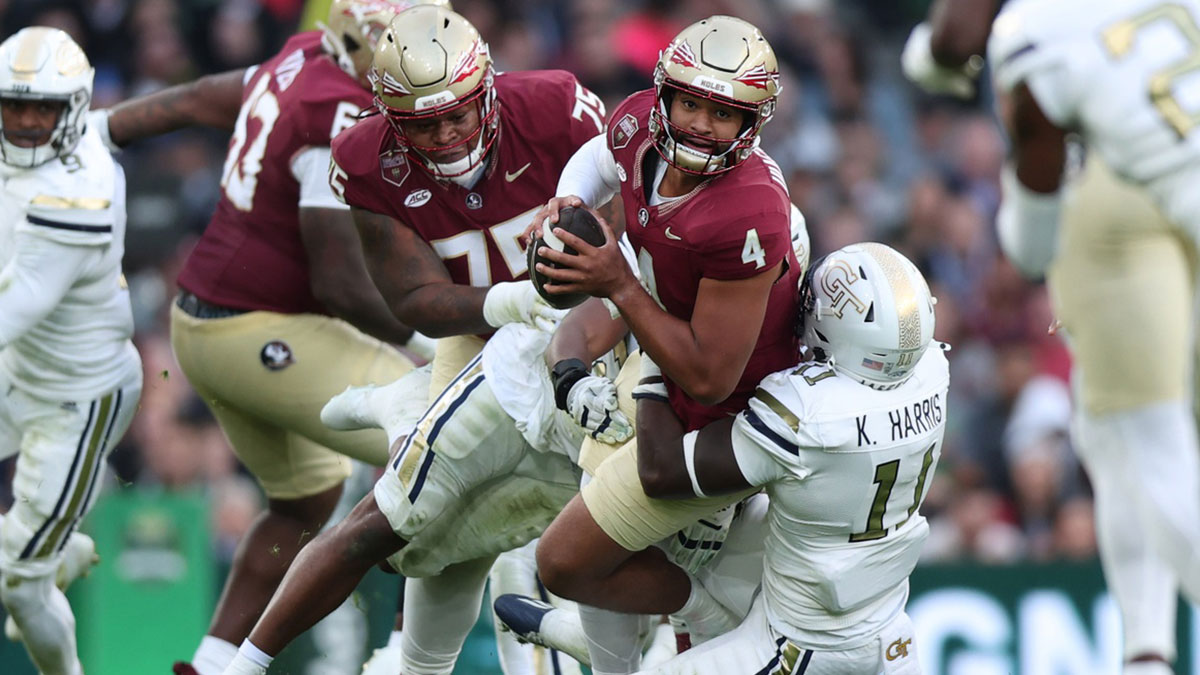 Georgia Tech defensive lineman Kevin Harris II tackles Florida State University quarterback DJ Uiagalelei at Aviva Stadium.
