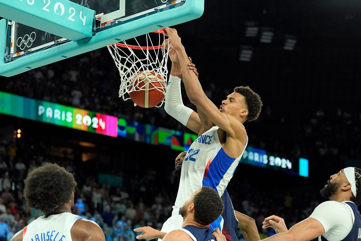 France power forward Victor Wembanyama (32) shoots against the United States in the second half in the men's basketball gold medal game during the Paris 2024 Olympic Summer Games at Accor Arena. 