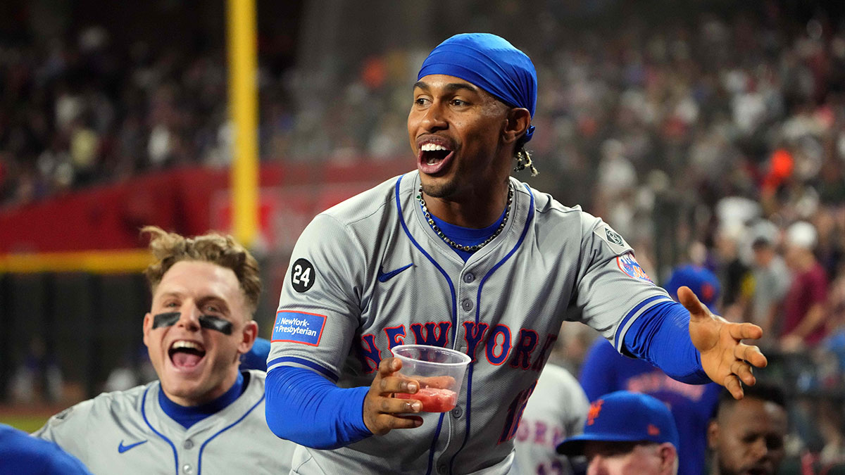 New York Mets shortstop Francisco Lindor (12) and New York Mets outfielder Harrison Bader (44) celebrate against the Arizona Diamondbacks during the sixth inning at Chase Field.