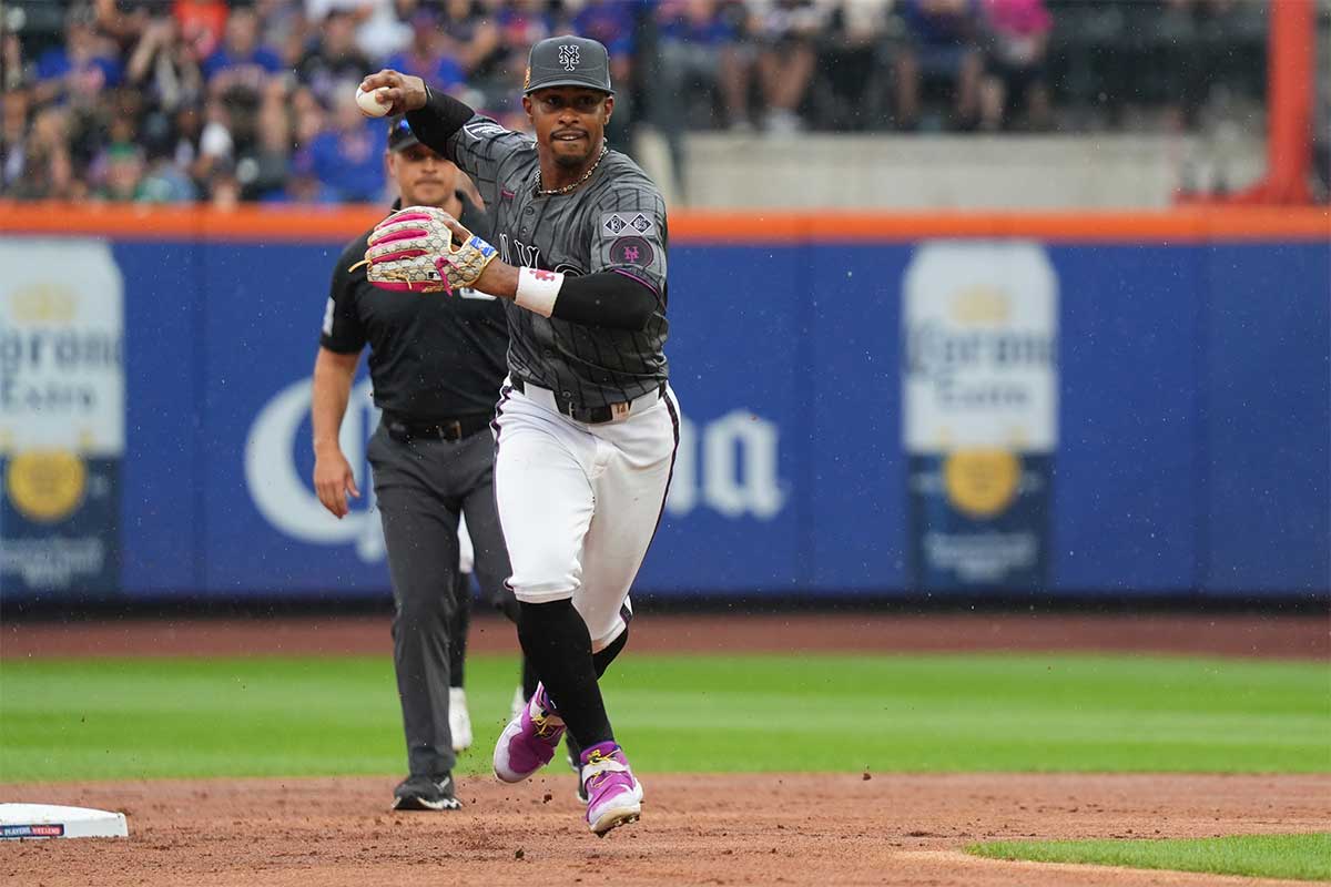 New York Mets shortstop Francisco Lindor (12) chases a base runner during the second inning against the Miami Marlins at Citi Field.
