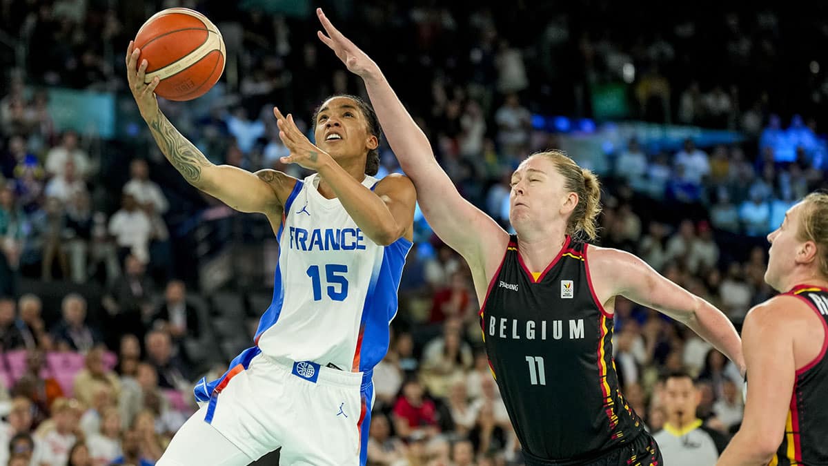 France forward Gabby Williams (15) shoots the ball in a women's basketball semifinal game during the Paris 2024 Olympic Summer Games at Accor Arena.