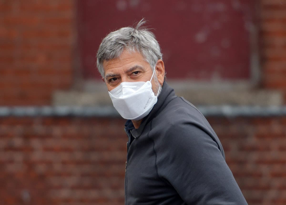 A masked George Clooney photographed in 2021.