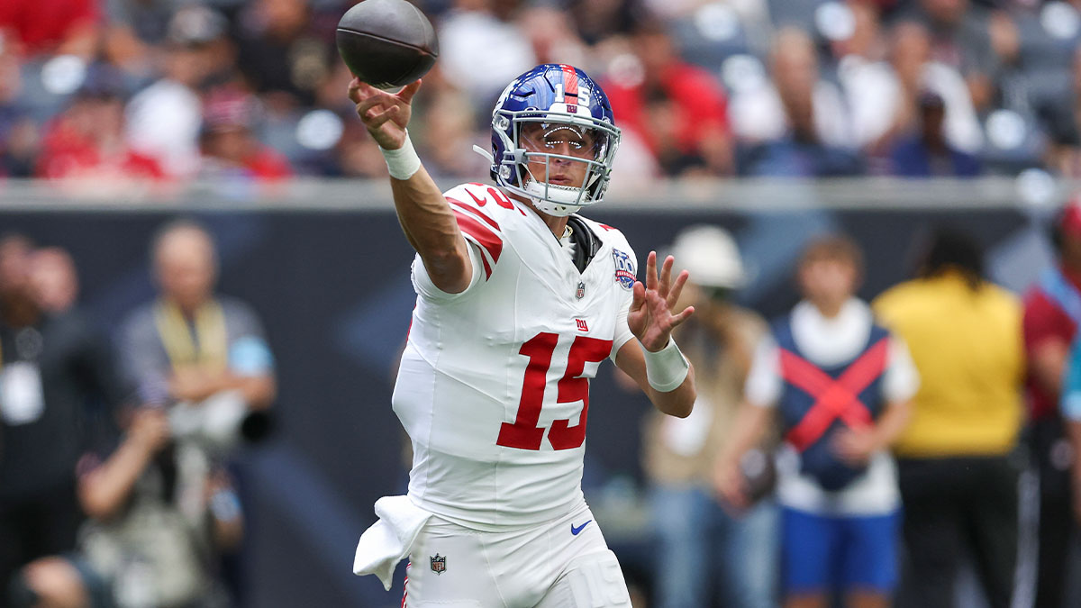 New York Giants quarterback Tommy DeVito (15) attempts a pass during the third quarter against the Houston Texans at NRG Stadium.