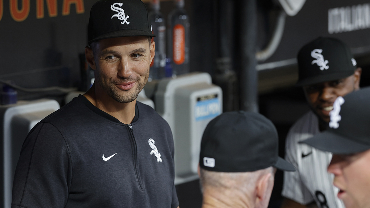 Aug 9, 2024; Chicago, Illinois, USA; Chicago White Sox interim manager Grady Sizemore (24) smiles before a baseball game against the Chicago Cubs at Guaranteed Rate Field.