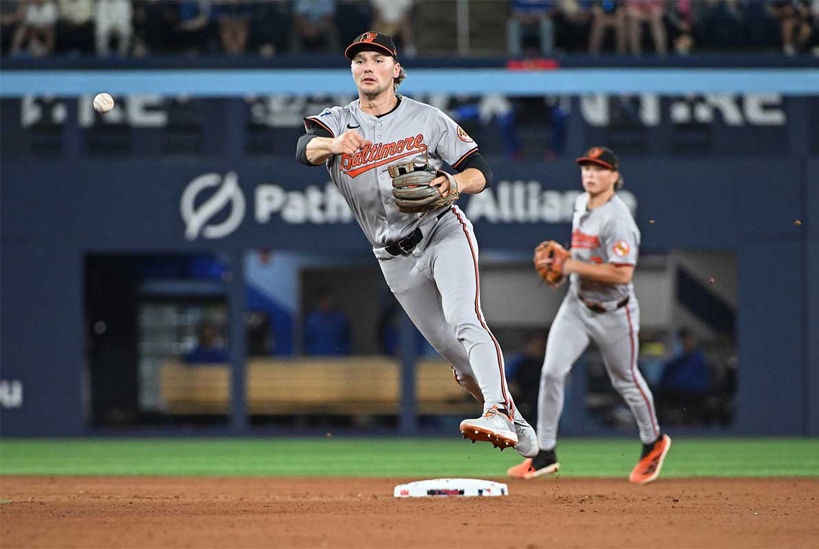 Baltimore Orioles short stop Gunnar Henderson (2) fields a ground ball by Toronto Blue Jays designated hitter George Springer (4) in the eighth inning at Rogers Centre.