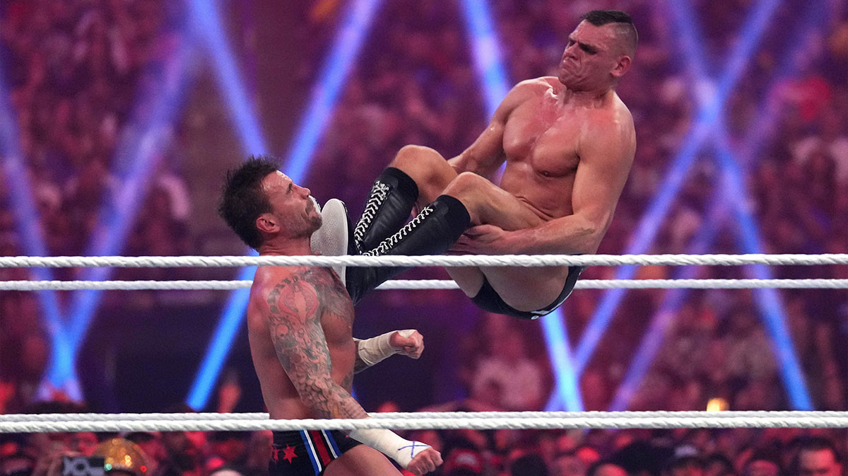 Gunther kicking CM Punk at the Royal Rumble.
