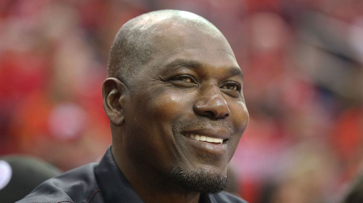 Hakeem Olajuwon watches the Houston Rockets play the Golden State Warriors in game six of the second round of the 2019 NBA Playoffs at Toyota Center.