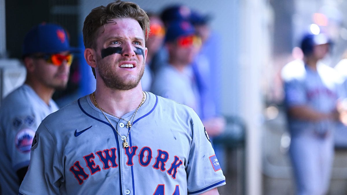 New York Mets outfielder Harrison Bader (44) watches the score board as a previous play is reviewed against the Los Angeles Angels during the seventh inning at Angel Stadium.