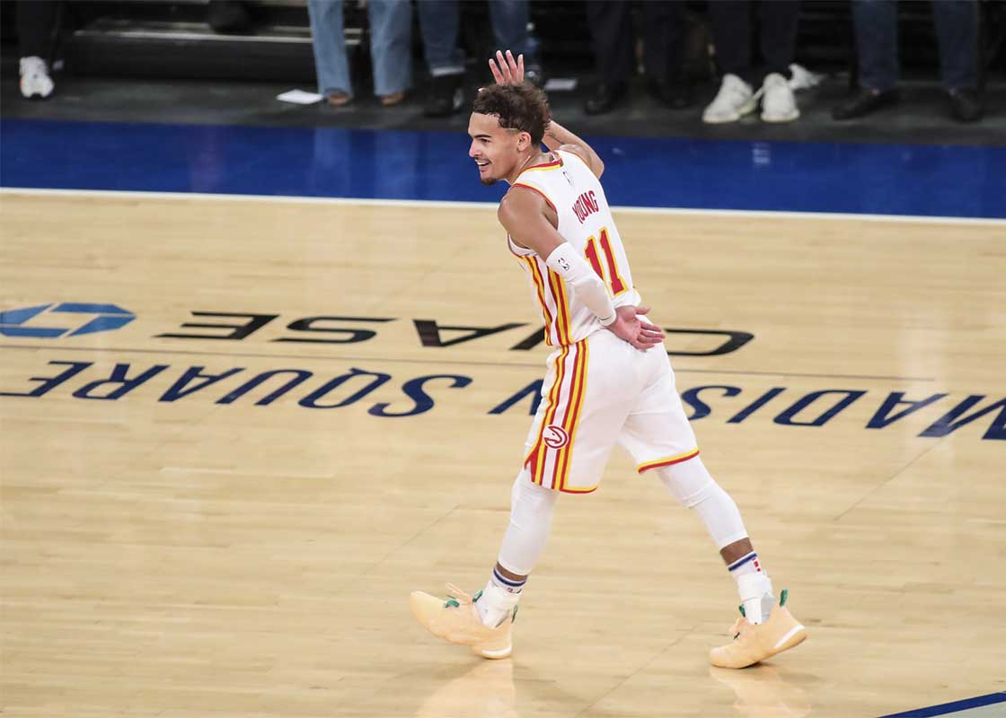 Atlanta Hawks guard Trae Young (11) waves to the crowd after making a three point shot in against the New York Knicks in the fourth quarter during game five in the first round of the 2021 NBA Playoffs at Madison Square Garden. 