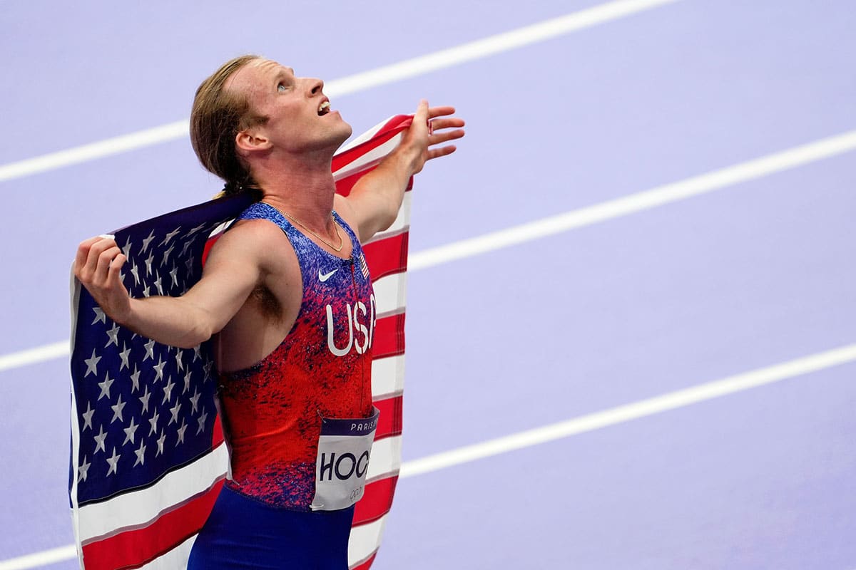 Cole Hocker (USA) celebrates after winning the menís 1500m final during the Paris 2024 Olympic Summer Games at Stade de France.