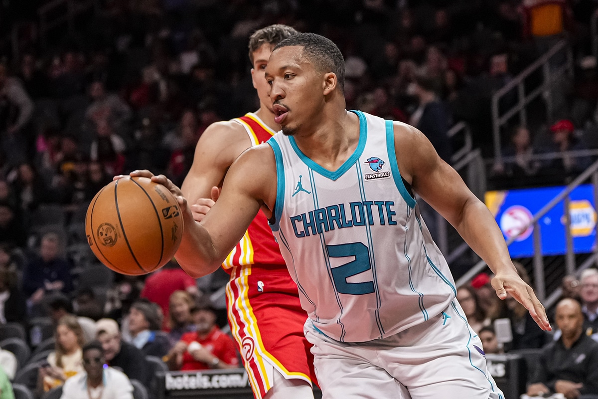 Charlotte Hornets forward Grant Williams (2) controls the ball against the Atlanta Hawks during the second half at State Farm Arena. 