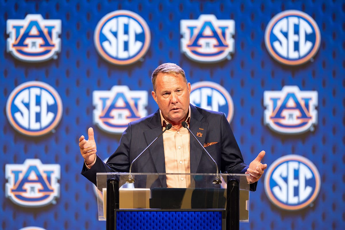 Auburn head coach Hugh Freeze speaking at Omni Dallas Hotel. 