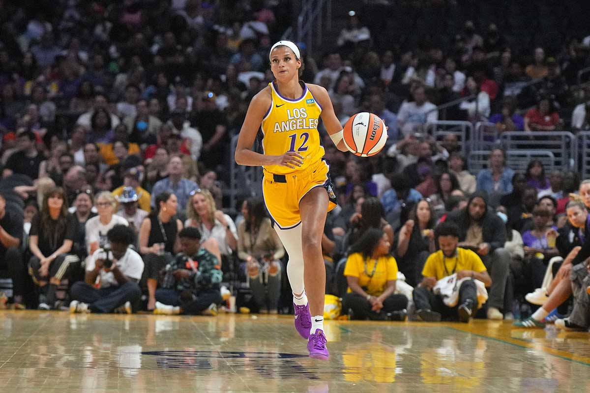 LA Sparks guard Rae Burrell (12) dribbles the ball against the New York Liberty in the second half at Crypto.com Arena.
