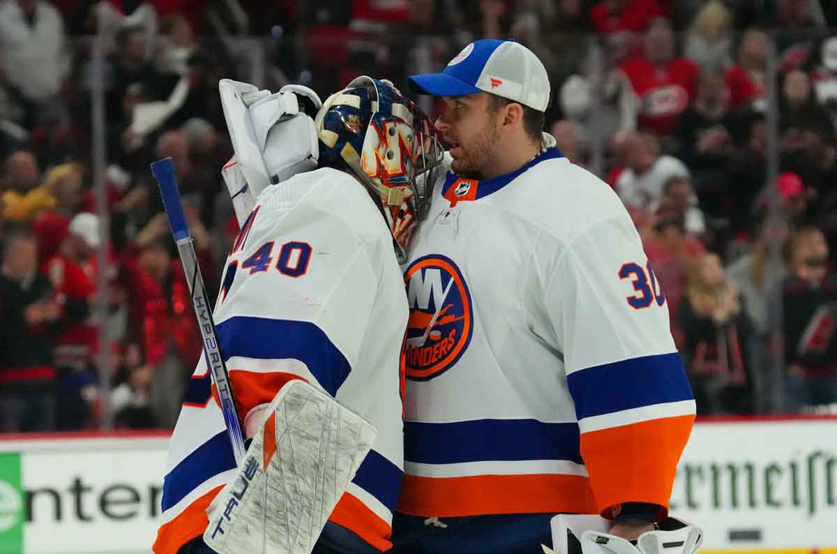 New York Islanders goaltender Semyon Varlamov (40) and goaltender Ilya Sorokin (30) greet each other after the loss to the Carolina Hurricanes in game five of the first round of the 2024 Stanley Cup Playoffs at PNC Arena.