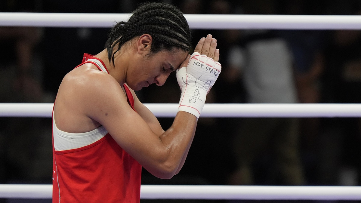 Imane Khelif (ALG) reacts after defeating Anna Luca Hamori (HUN) in a women's 66kg boxing quarterfinal during the Paris 2024 Olympic Summer Games at North Paris Arena.