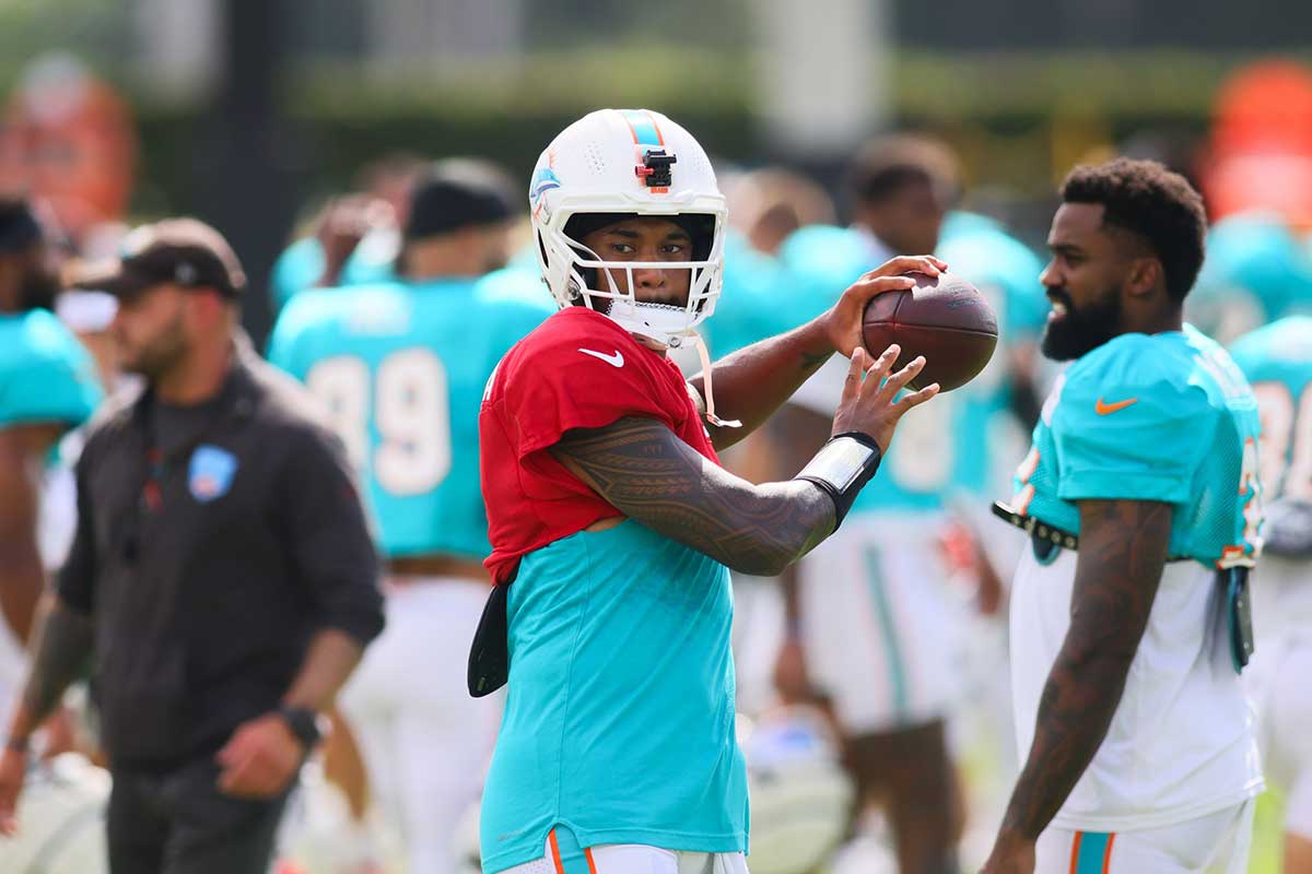 Miami Dolphins quarterback Tua Tagovailoa (1) throws the football during a joint practice with the Atlanta Falcons at Baptist Health Training Complex.