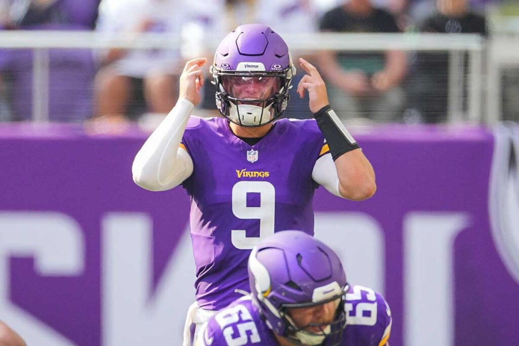 Minnesota Vikings quarterback J.J. McCarthy (9) under center against the Las Vegas Raiders in the third quarter at U.S. Bank Stadium. 