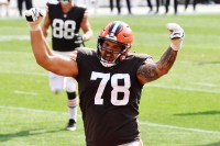 Cleveland Browns offensive tackle Jack Conklin (78) celebrates after running back Nick Chubb (not pictured) scored a touchdown during the second half against the Washington Football Team at FirstEnergy Stadium.