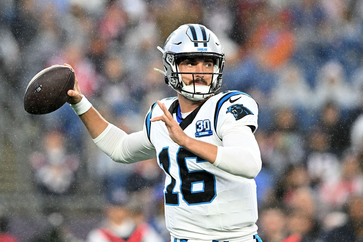 Carolina Panthers quarterback Jack Plummer (16) looks to throw against the New England Patriots during the first half at Gillette Stadium.