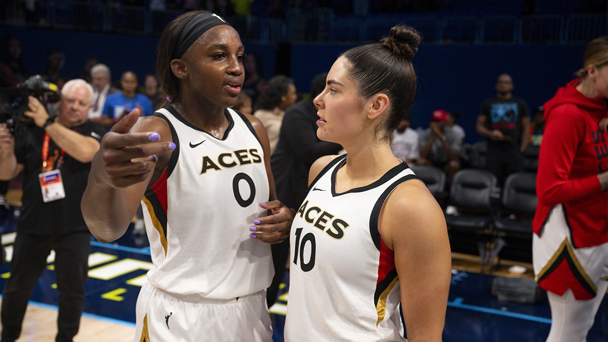  Las Vegas Aces guard Jackie Young (0) and guard Kelsey Plum (10) talk on the court after the Aces victory over the Dallas Wings during game three of the 2023 WNBA Playoffs at College Park Center.