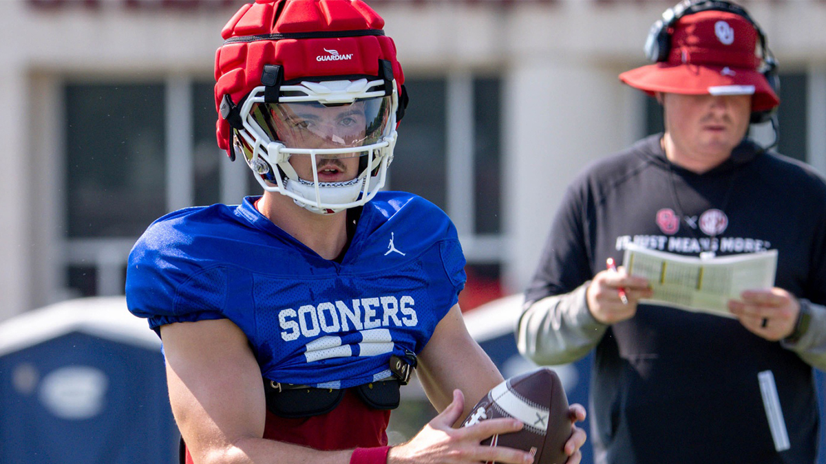 Jackson Arnold (11) warms up during a Oklahoma football practice