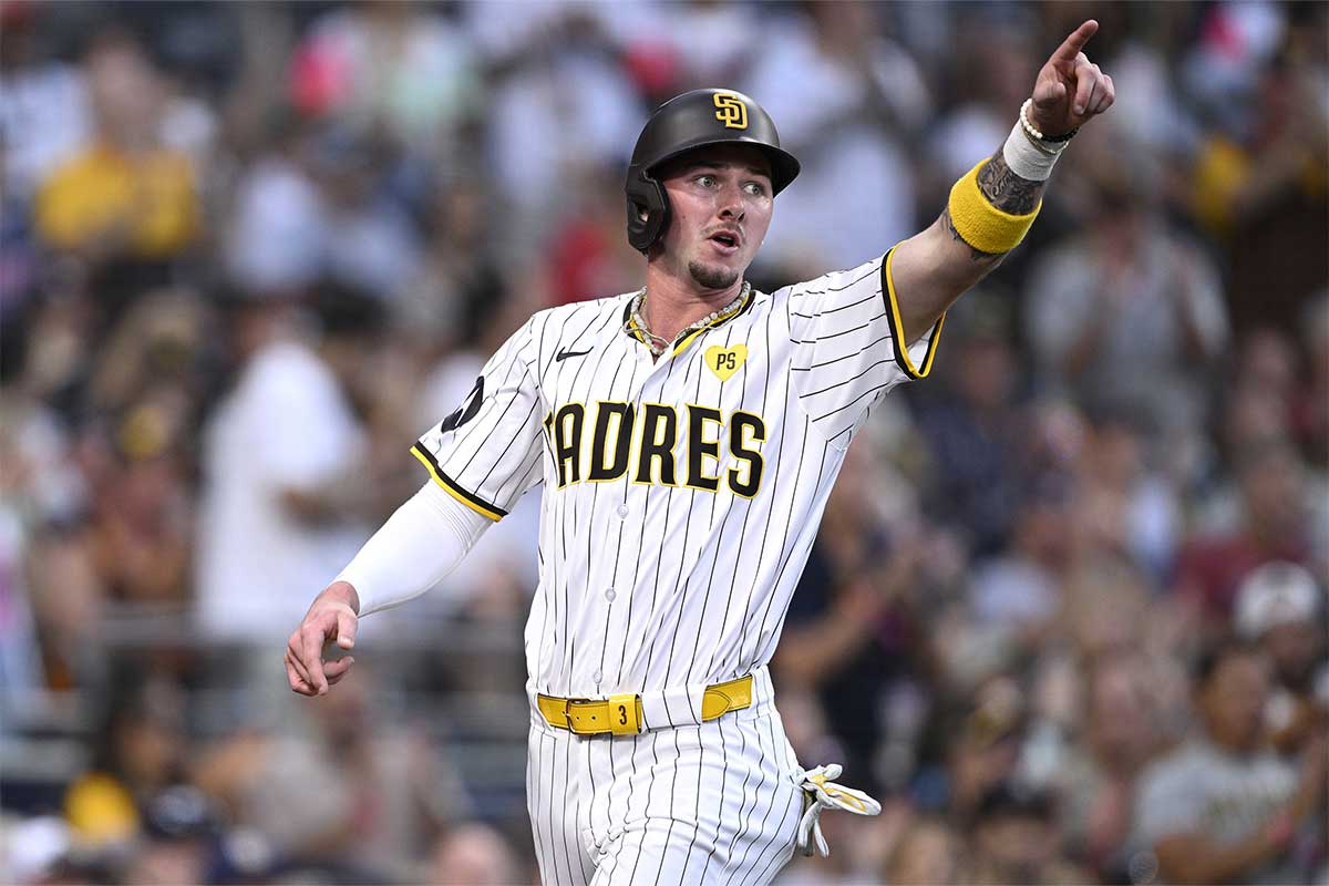 San Diego Padres center fielder Jackson Merrill (3) gestures after scoring a run against the Minnesota Twins during the second inning at Petco Park.