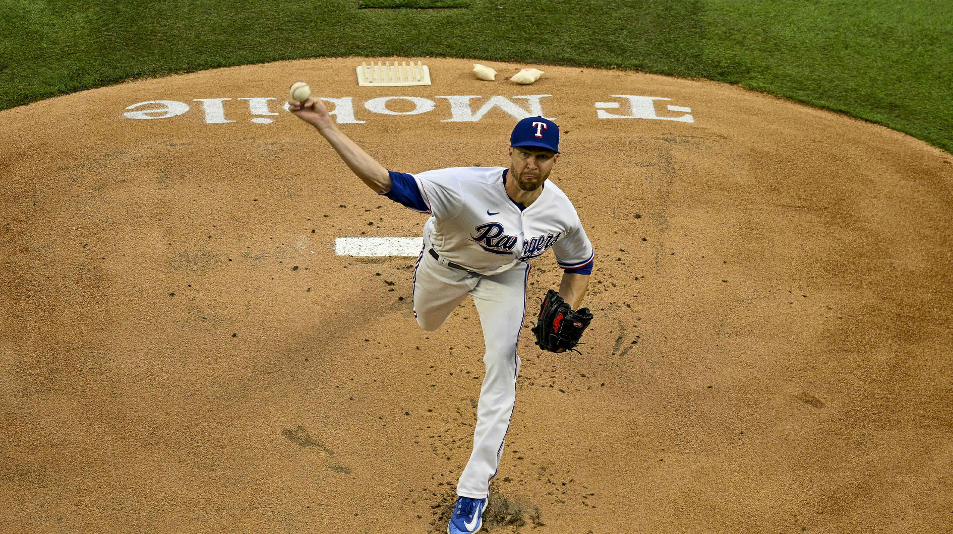 Mar 30, 2023; Arlington, Texas, USA; Texas Rangers starting pitcher Jacob deGrom (48) pitches against the Philadelphia Phillies during the first inning at Globe Life Field.