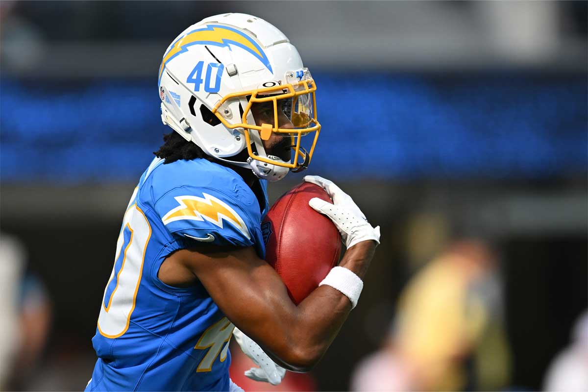Aug 10, 2024; Inglewood, California, USA; Los Angeles Chargers wide receiver Jaelen Gill (40) runs the ball against the Seattle Seahawks during the second quarter at SoFi Stadium.