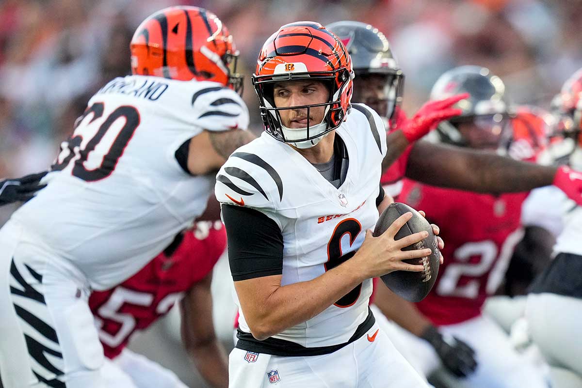 Cincinnati Bengals quarterback Jake Browning (6) rolls out in the first quarter of the NFL Preseason Week 1 game between the Cincinnati Bengals and the Tampa Bay Buccaneers at Paycor Stadium in downtown Cincinnati on Saturday, Aug. 10, 2024.