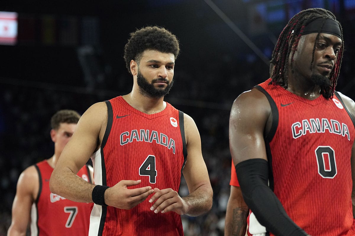 Canada guard Jamal Murray (4) leaves the court after the loss against France in a men’s basketball quarterfinal game during the Paris 2024 Olympic Summer Games at Accor Arena.