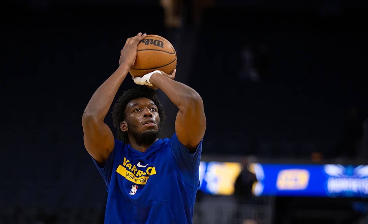 Golden State Warriors center James Wiseman warms up before taking on the Charlotte Hornets at Chase Center. 
