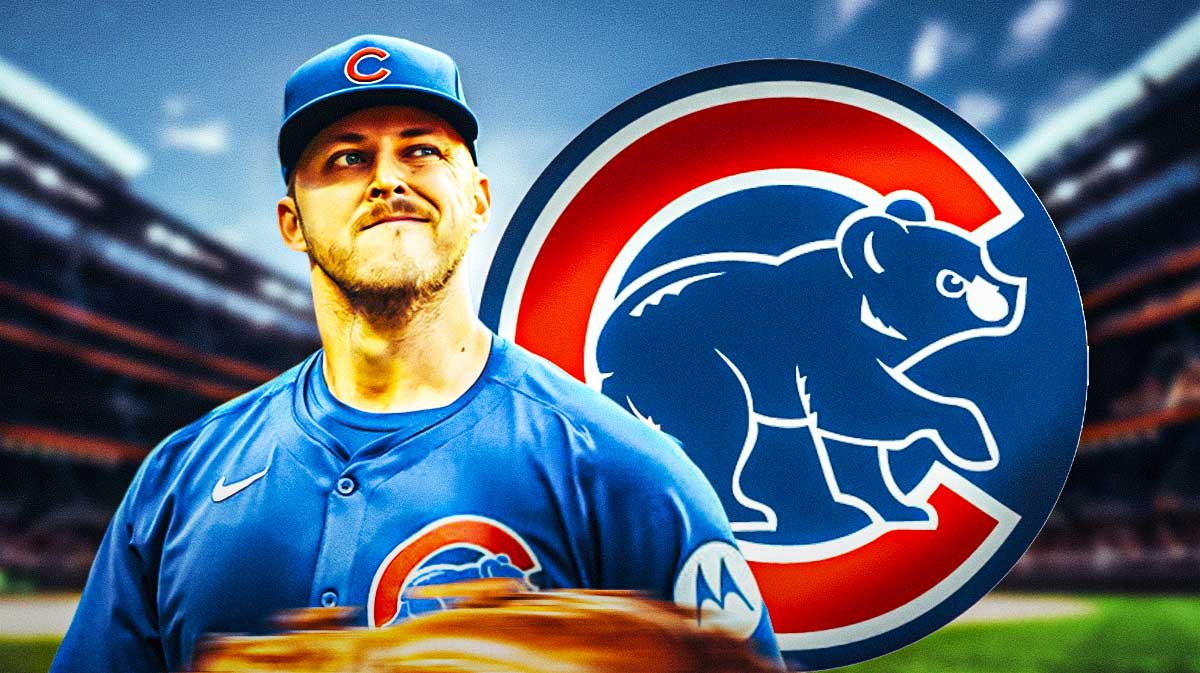 Jameson Taillon in front of Cubs logo