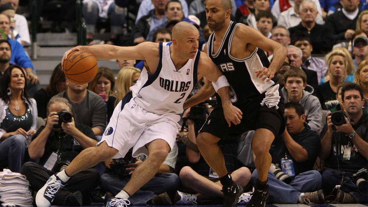 Dallas Mavericks guard Jason Kidd (2) drives against San Antonio Spurs guard Tony Parker (9) during the fourth quarter in game one in the first round of the 2010 NBA playoffs at the American Airlines Center. The Mavs beat the Spurs 100-94.