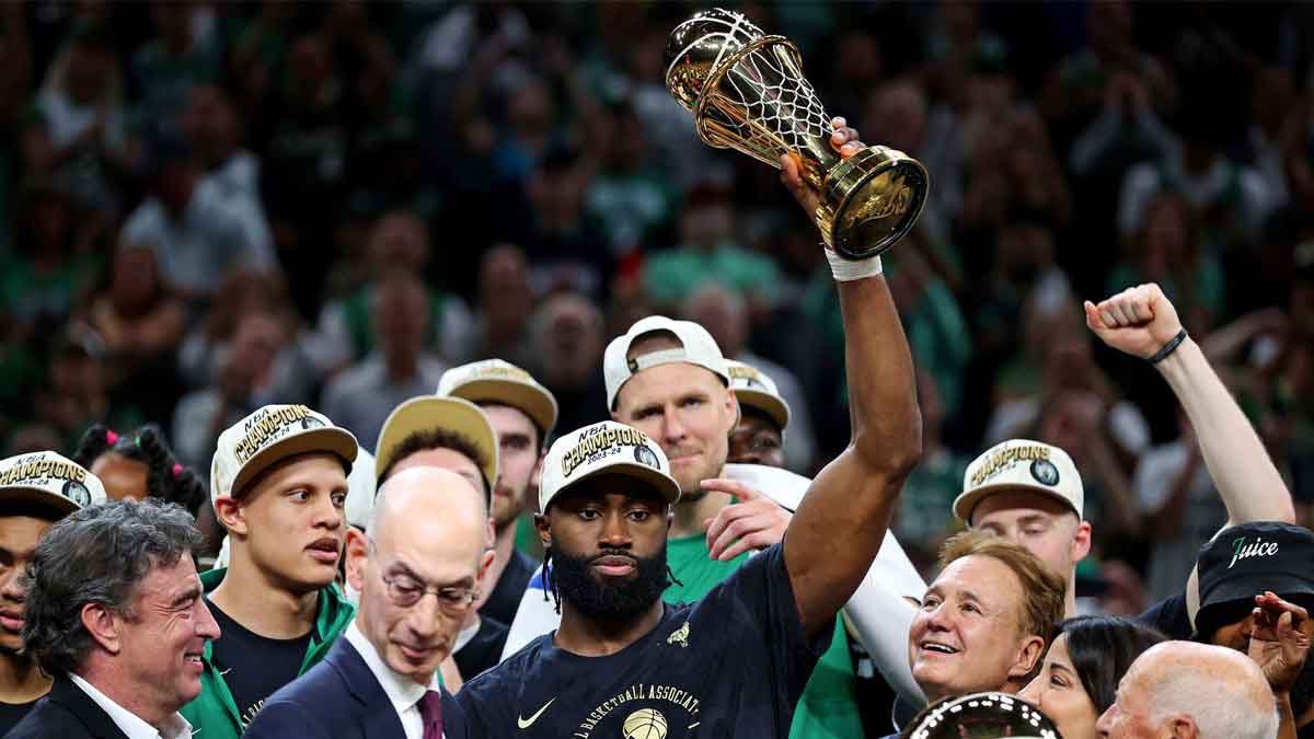 Boston Celtics guard Jaylen Brown (7) celebrates after winning the NBA Finals MVP after game five of the 2024 NBA Finals against the Dallas Mavericks at TD Garden.