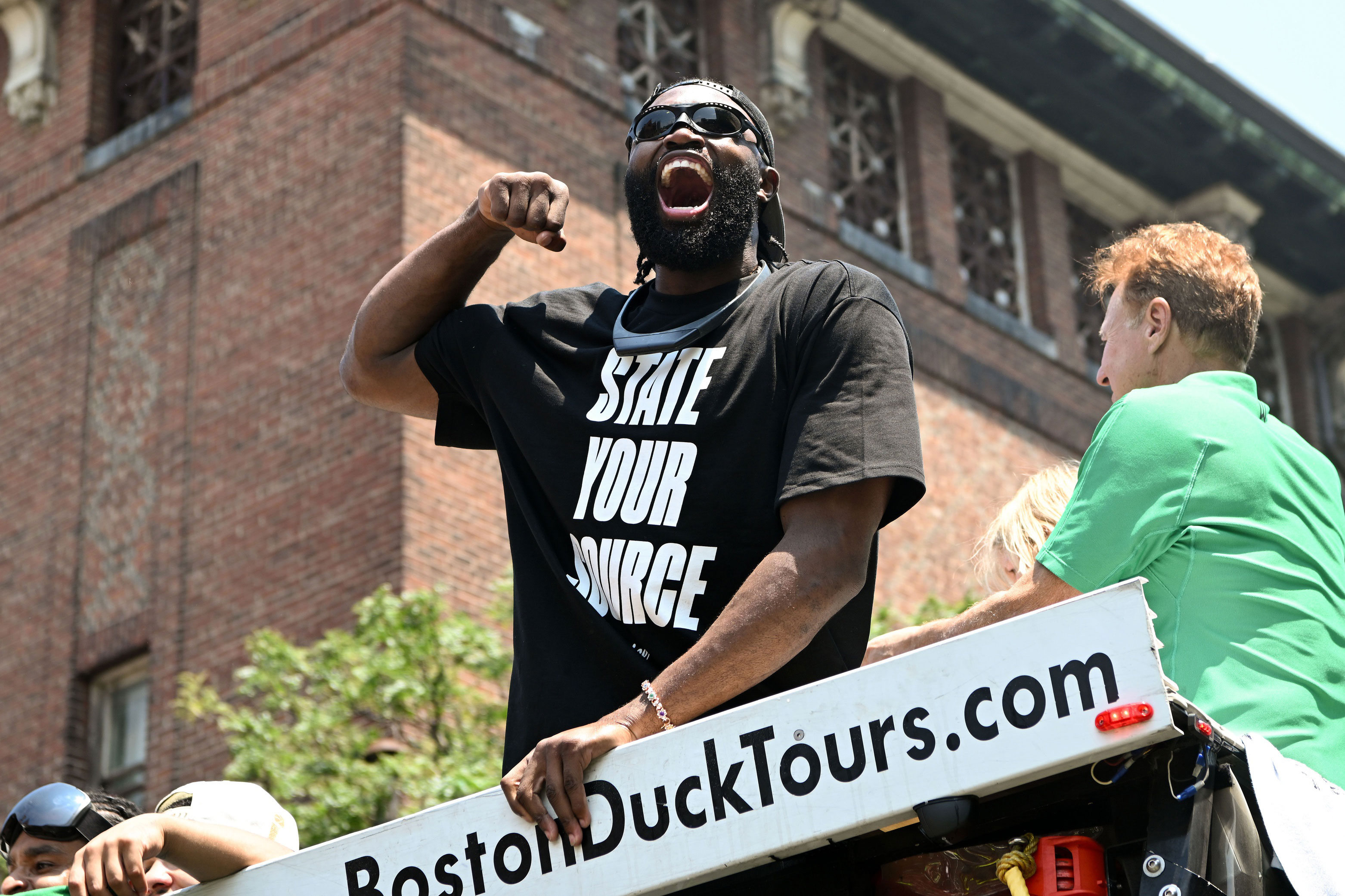 Boston Celtics guard Jaylen Brown (7) reacts during the 2024 NBA Championship parade in Boston.